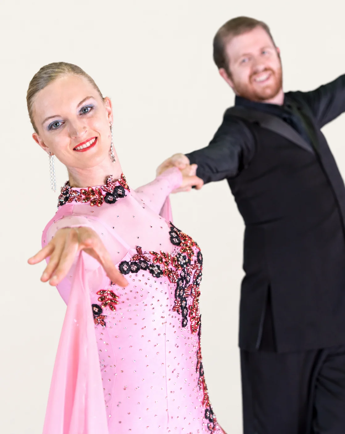 Eric and Bria Bird dance lessons in Fort Worth with a connected partner frame